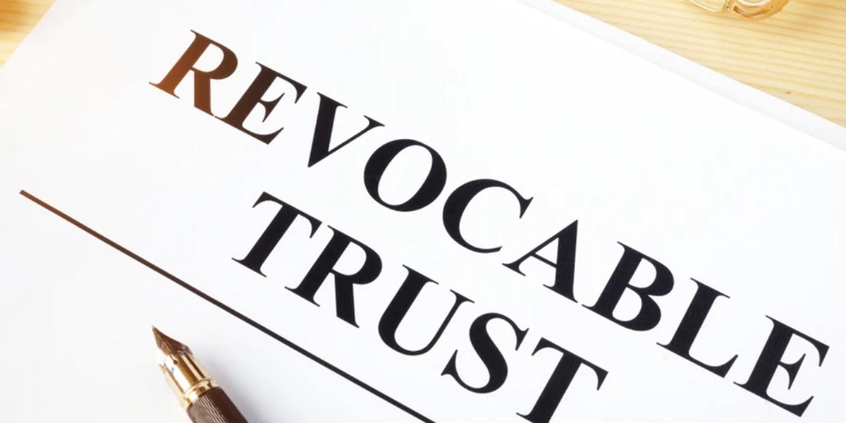 What is a Revocable Living Trust - Revocable Trust notice on the top of a piece of pager.